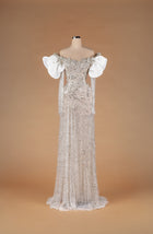 Sihëna Nocturne Veil Drapery — ivory off-shoulder sweetheart gown with crystal floral beadwork and white organza petal sleeves.