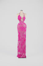 Sihëna Electric Fuchsia Bloom — fuchsia halter column gown with 3D-floral petals and crystal beadwork on sheer nude tulle.
