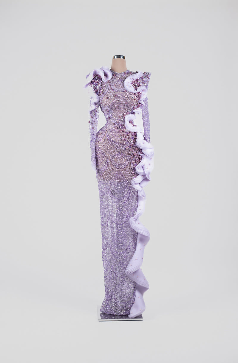 Sihëna Amethyst Tidal Halo — lilac high-neck long-sleeve gown with pearl-crystal beadwork on sheer tulle and a cascading organza ruffle.