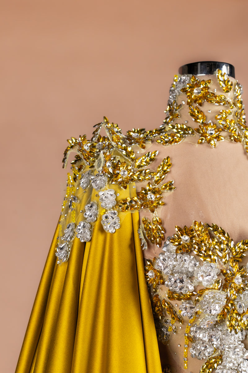Sihëna Ochre Blossom Cape — marigold high-neck cape-sleeve column evening dress