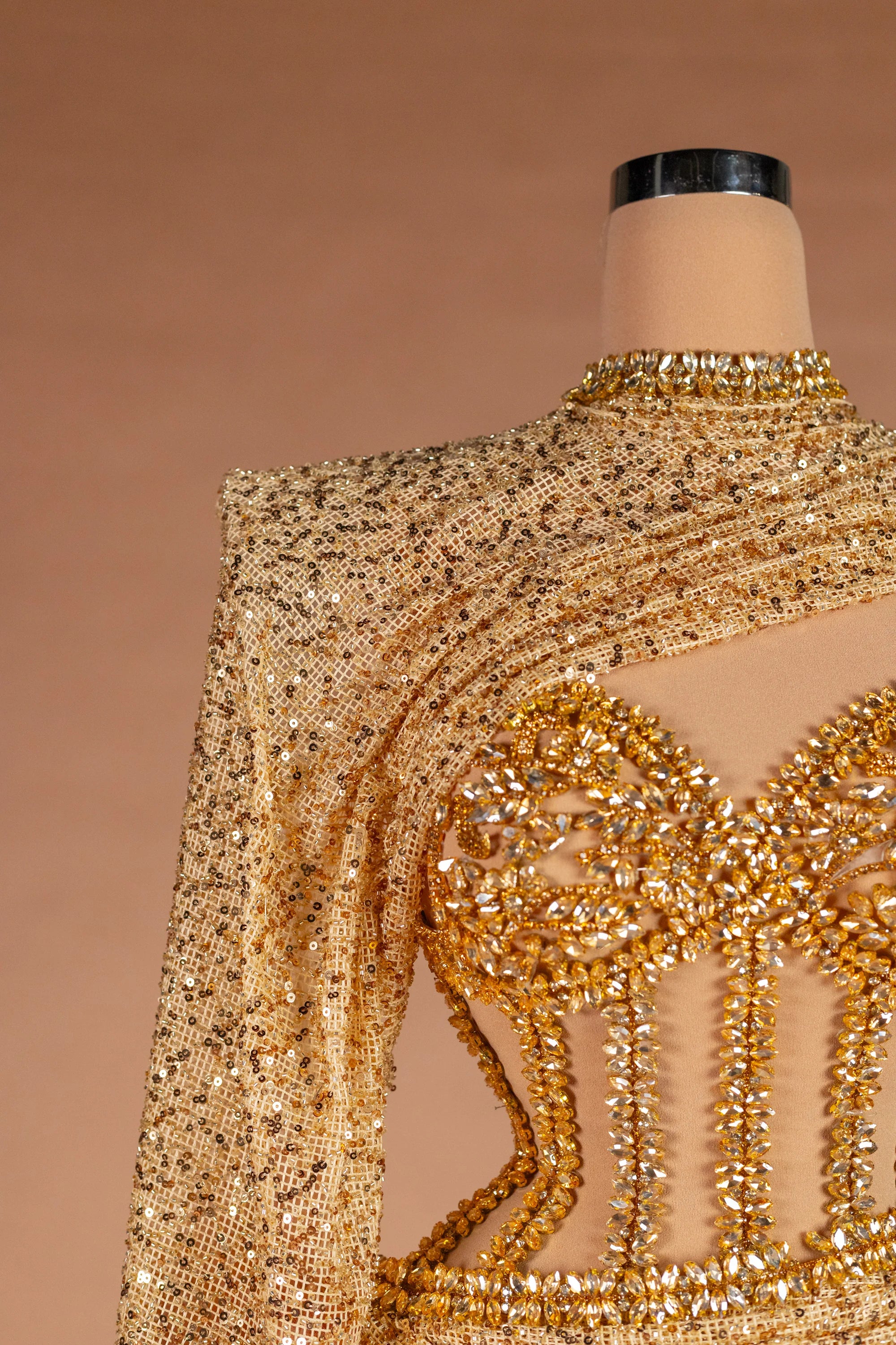 Sihëna Aureate Comet — gold illusion long-sleeve fitted evening dress