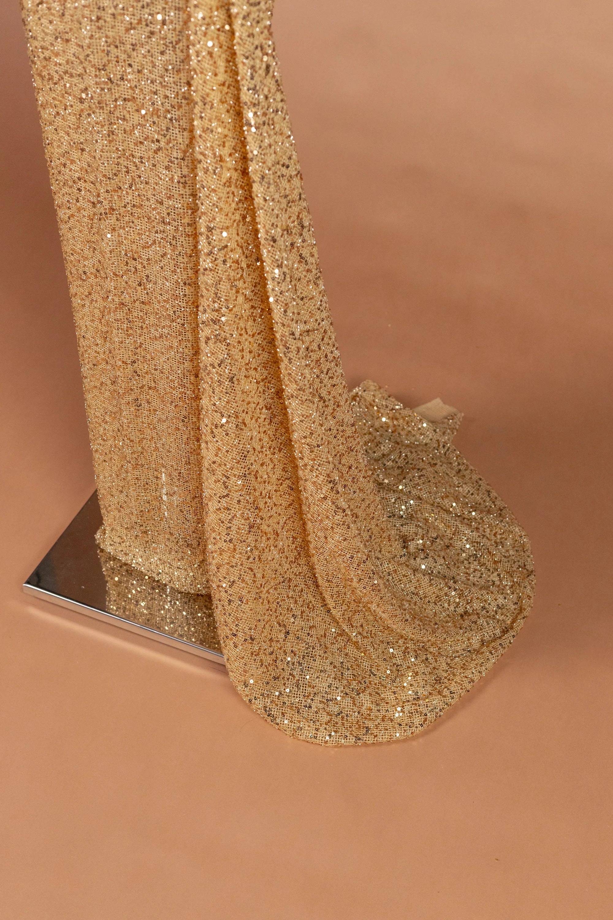 Sihëna Aureate Comet — gold illusion long-sleeve fitted evening dress