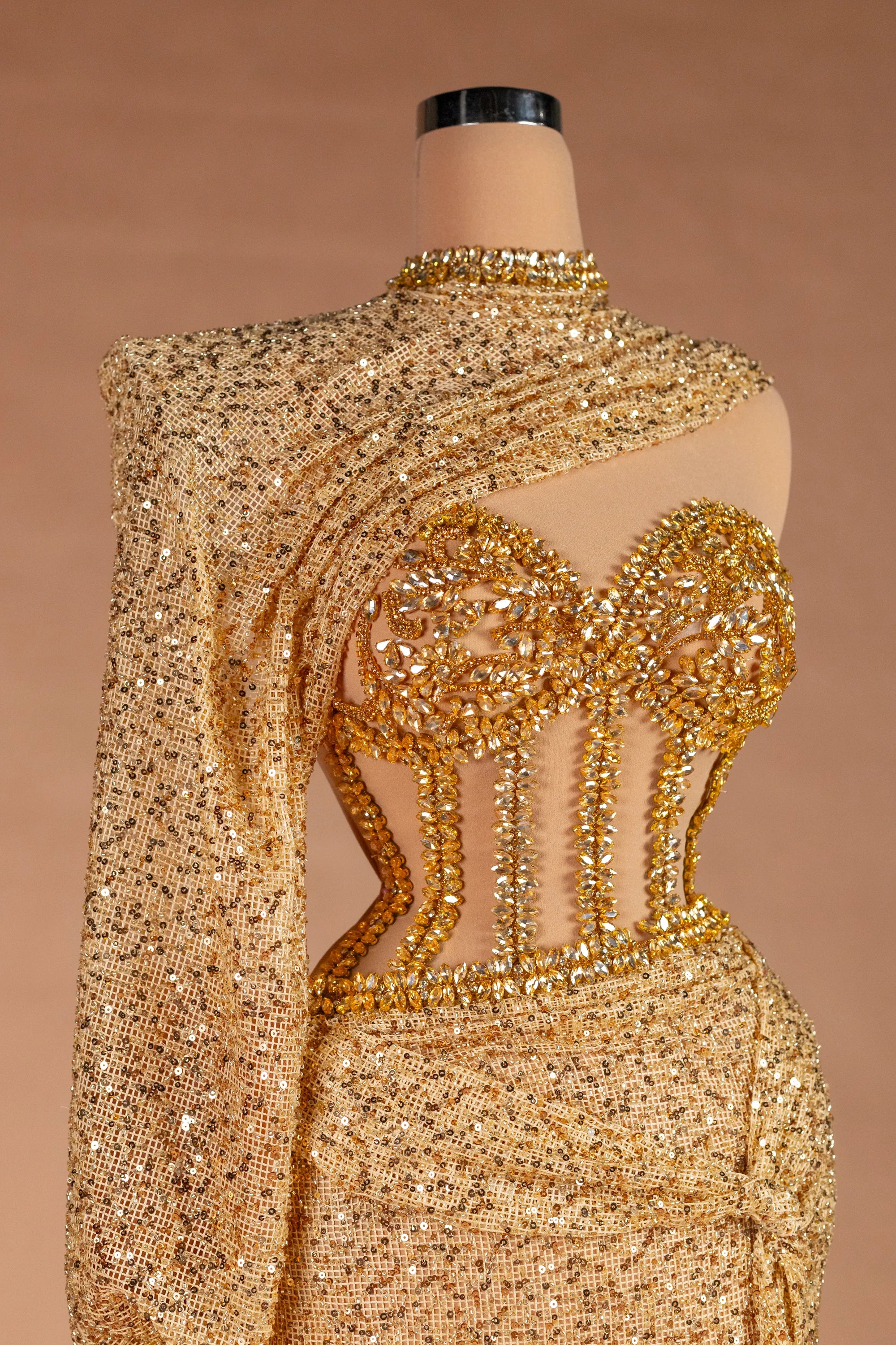 Sihëna Aureate Comet — gold illusion long-sleeve fitted evening dress