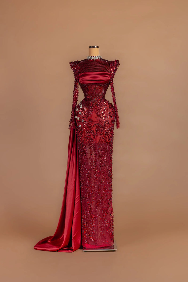 Sihëna Garnet Vesper — crimson high-neck long-sleeve column gown with crystal beading.