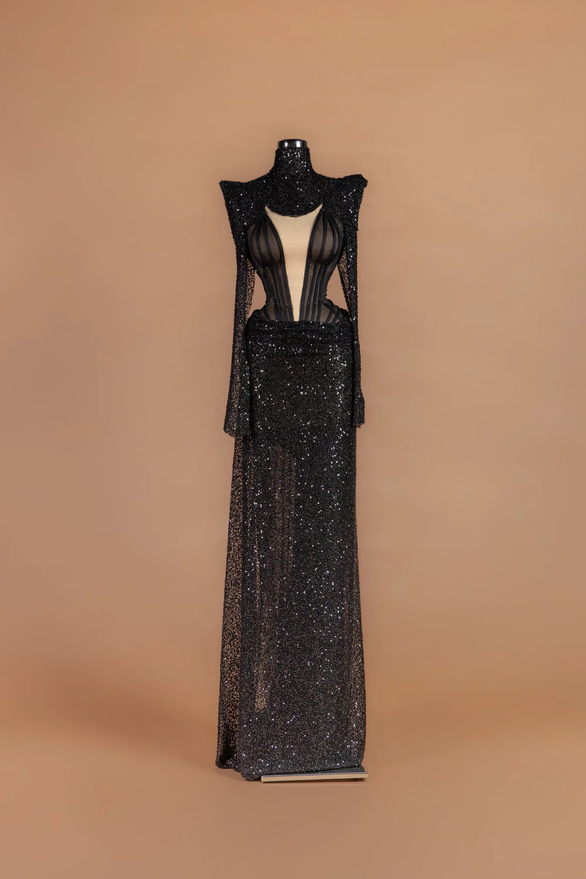 Sihëna Jet Vesper — black high-neck long-sleeve column gown with a sheer boned corset bodice.