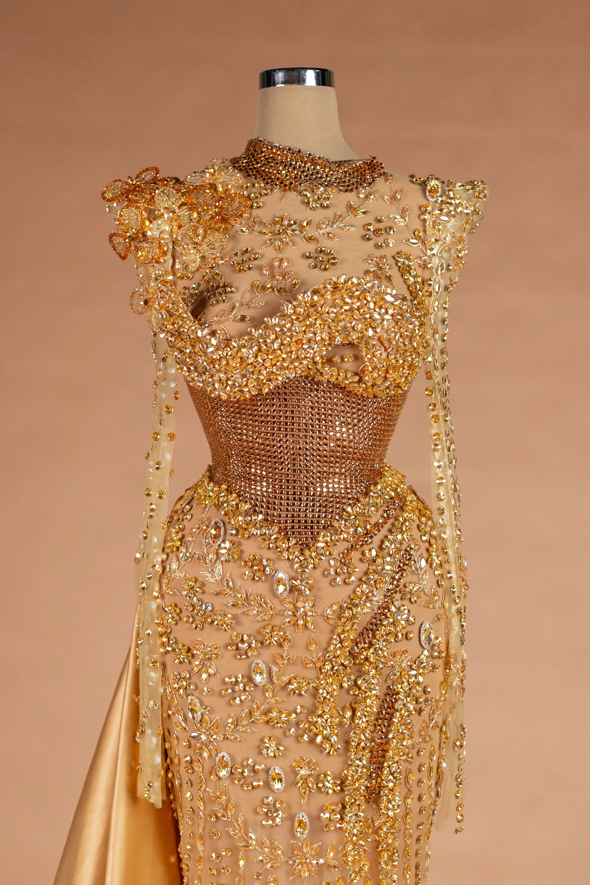Sihëna Molten Regalia — gold high-neck long-sleeve column evening dress