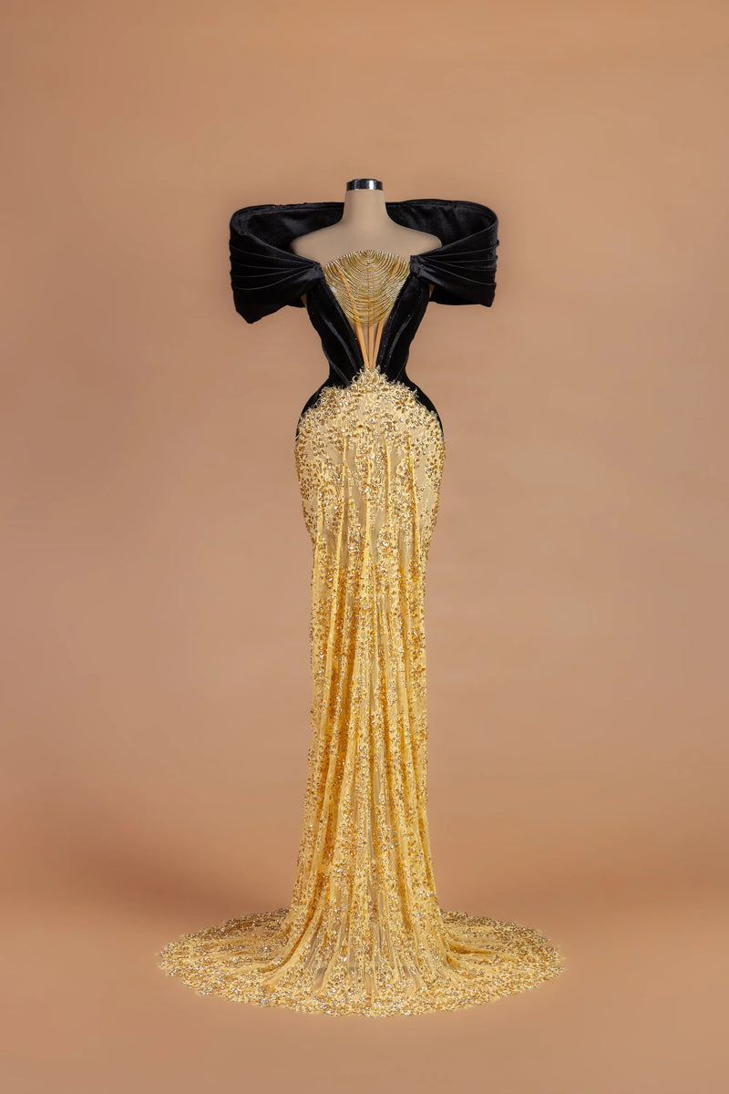 Sihëna Onyx Rivière — gold v-neck off-shoulder mermaid gown with cascading crystal chains at the neckline.