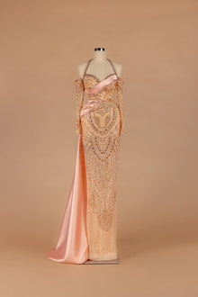 Sihëna Peach Aubade — blush halter off-shoulder column gown with allover crystal beadwork.