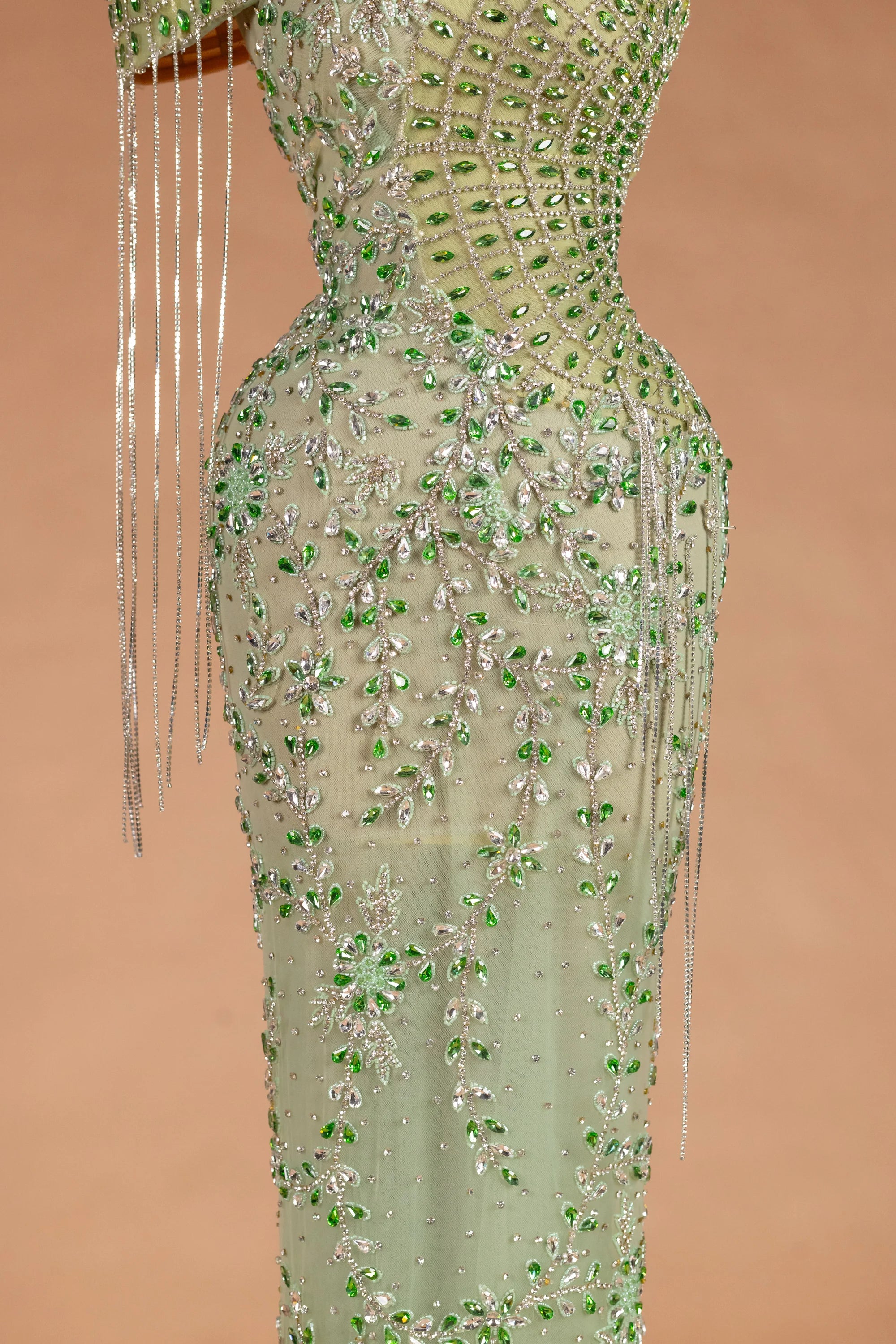 Sihëna Peacock Regalia — sage-green asymmetric sleeveless mermaid evening dress