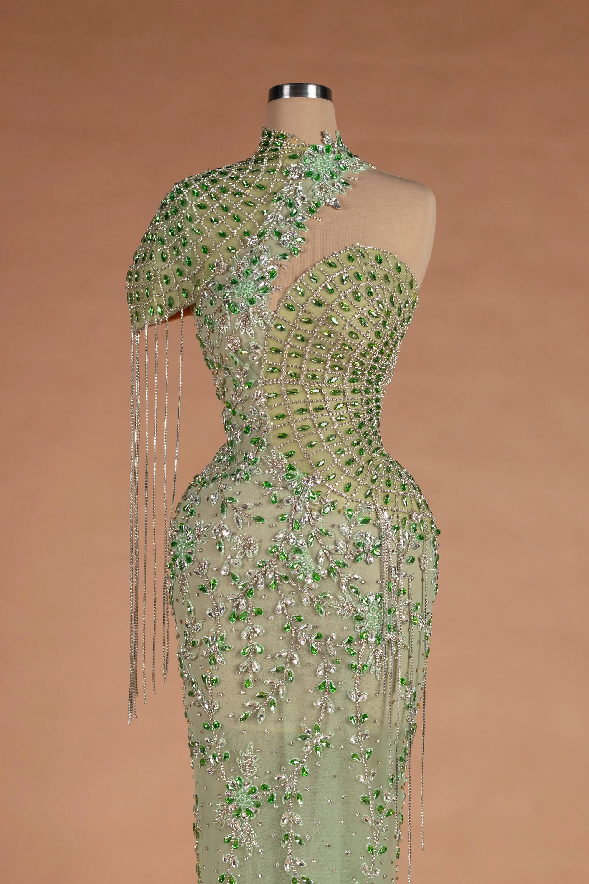 Sihëna Peacock Regalia — sage-green asymmetric sleeveless mermaid evening dress