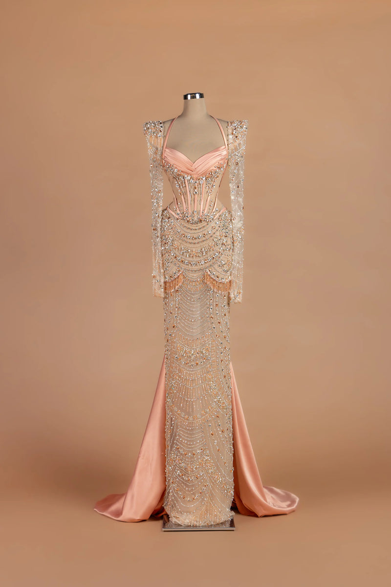 Sihëna Peony Sautoir — blush sweetheart long-sleeve sheath gown with cascading bead-strand swags.