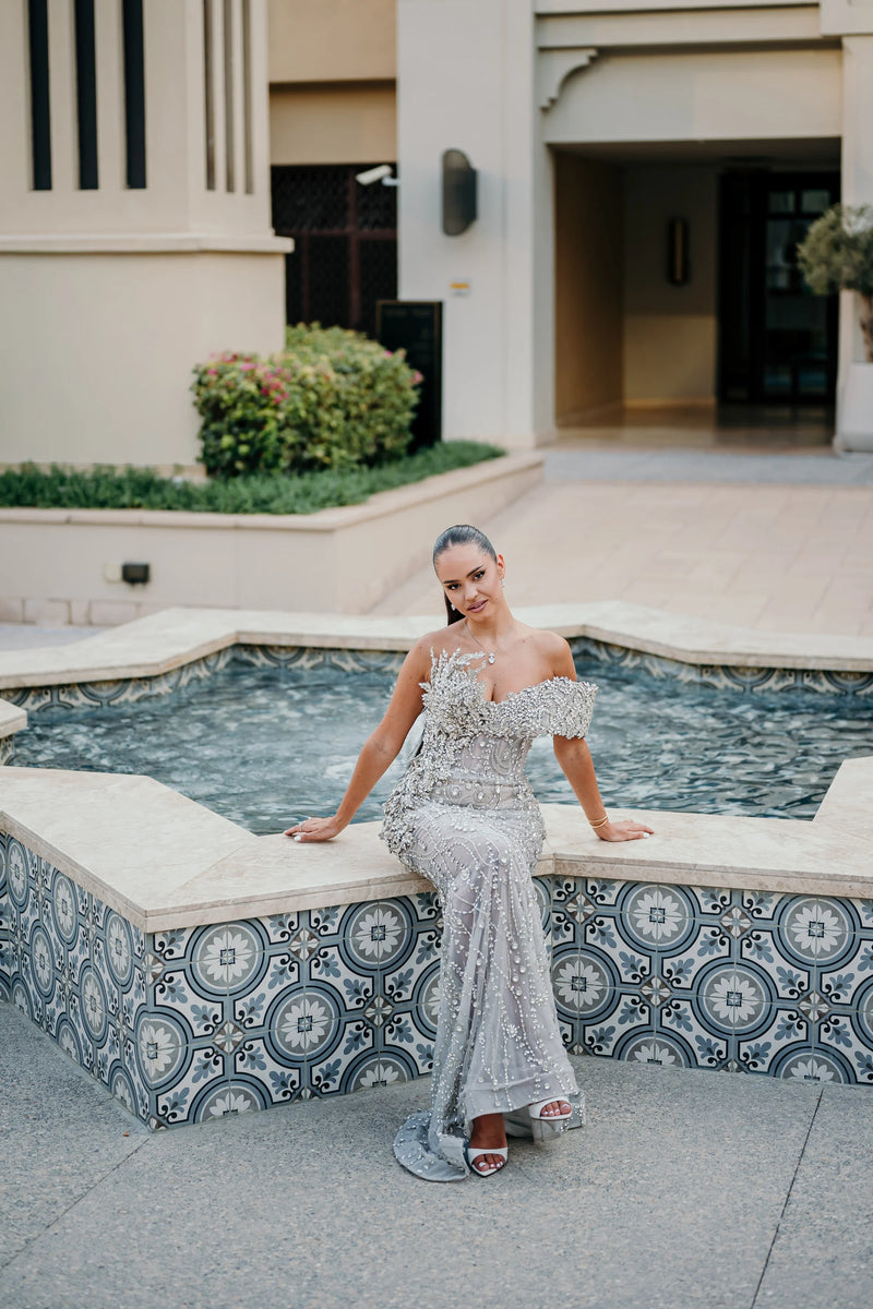 Sihëna Platinum Aigrette — silver sweetheart off-shoulder column evening dress